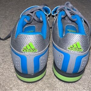 Adidas lifters—brand new, worn once.
